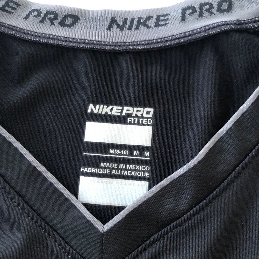 NWOT Nike Pro fit black athletic shirt. Size M (8-10)